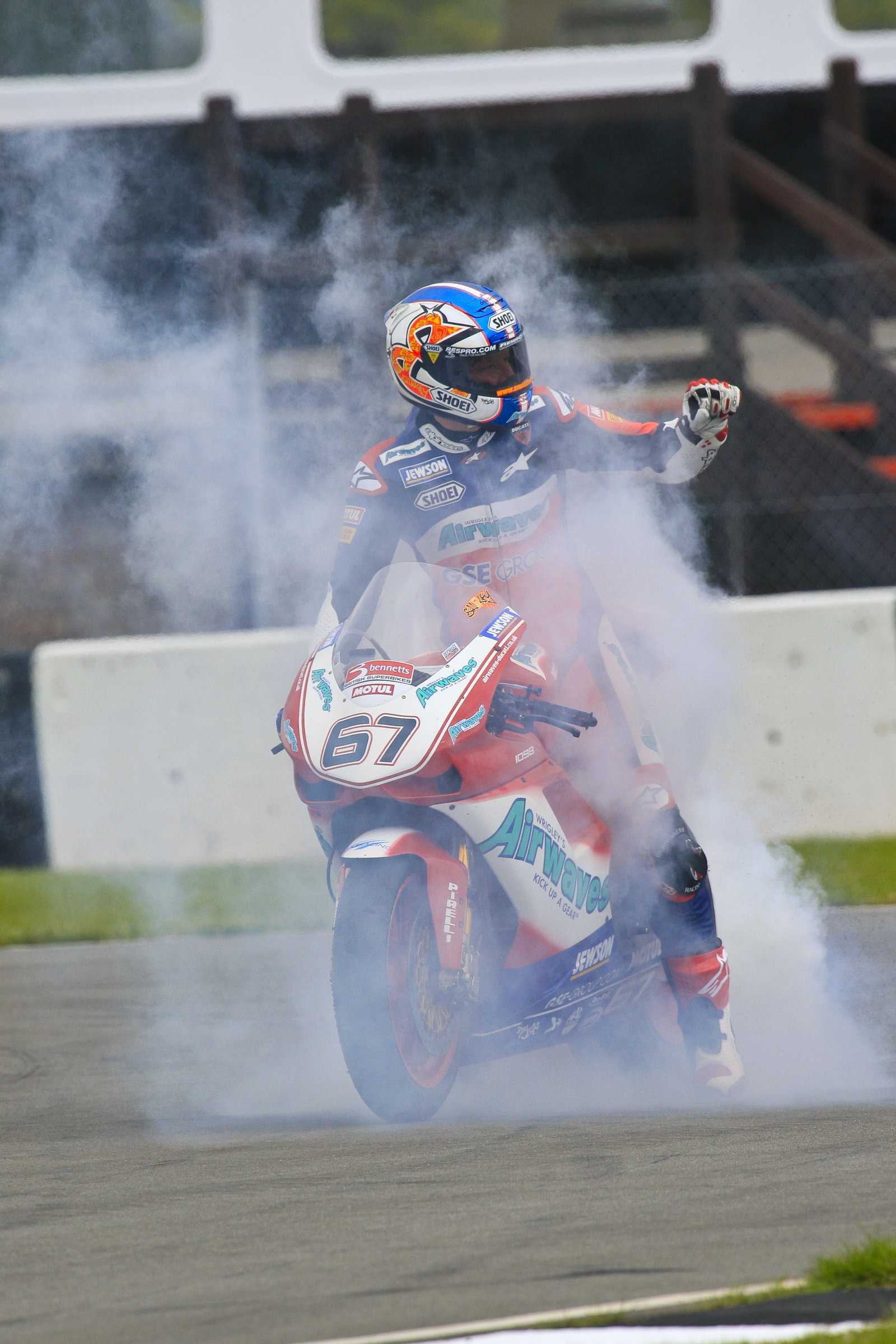 67. Shane Byrne Airwaves Ducati, Ducati 1098R F08 performs a burnout after winning race 2