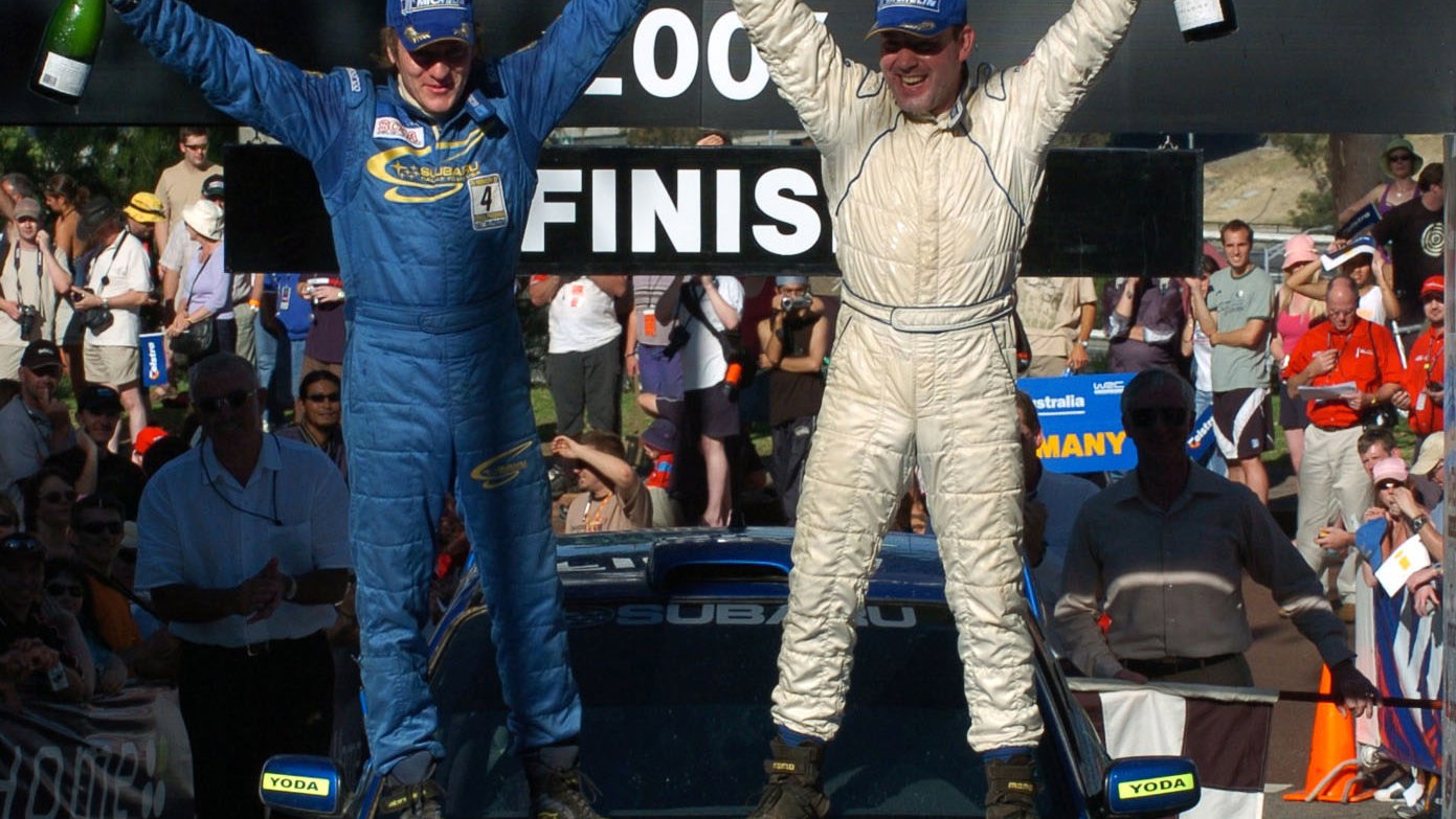 Niall McShea and Chris Patterson celebrate on the podium in Oz after finishing second to clinch the 