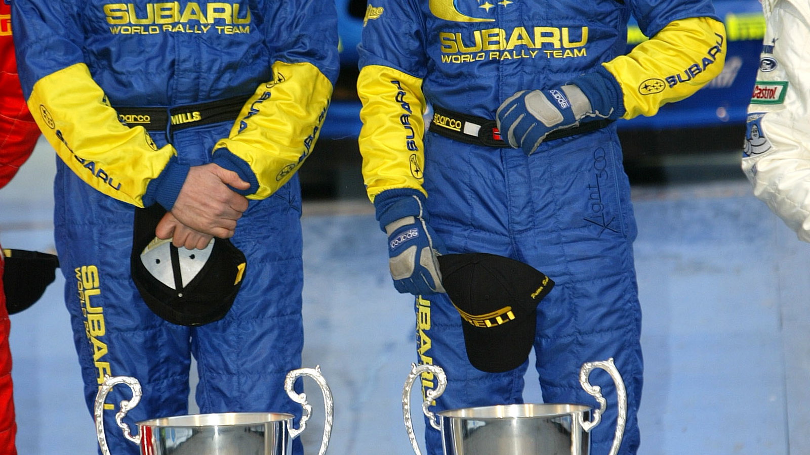 Subaru`s Petter Solberg and Phil Mills celebrate their victory on the Swedish Rally