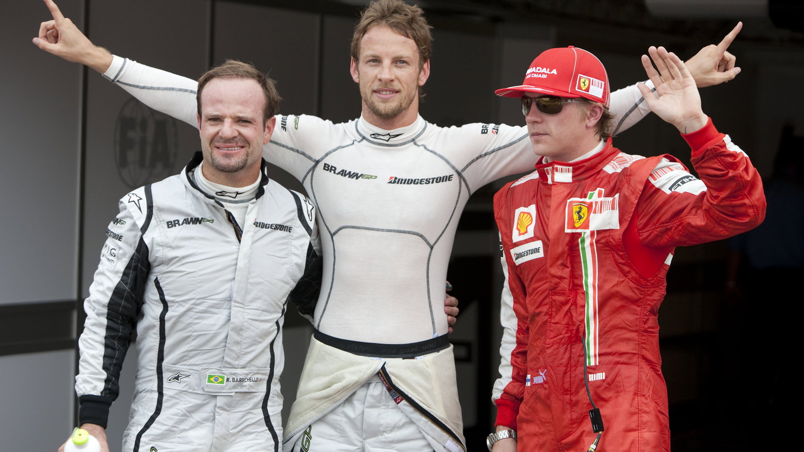 Rubens Barrichello (BRA) Brawn BGP001, Jenson Button (GBR) Brawn BGP001, Kimi Raikkonen (FIN) Ferrar