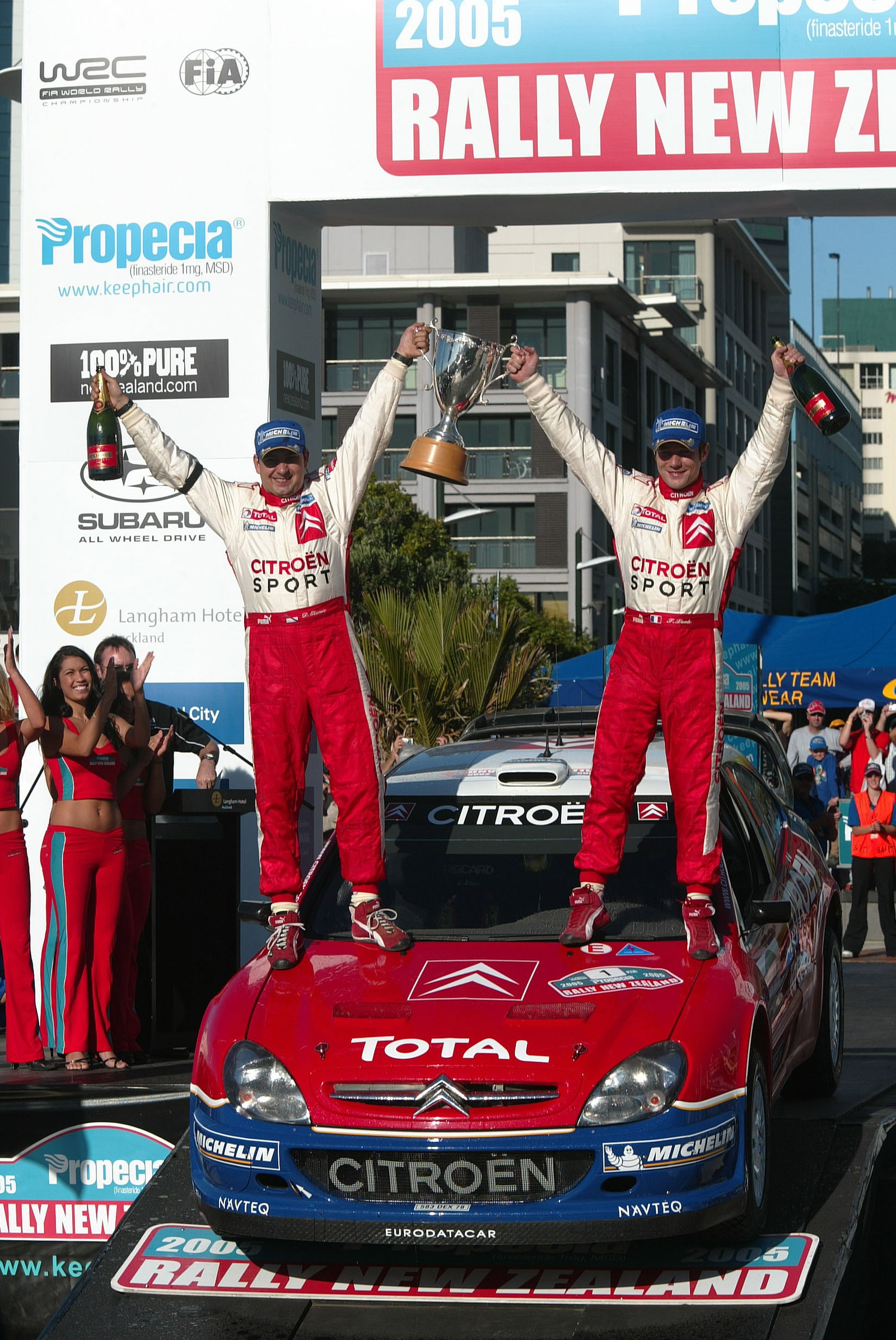 Citroen`s Sebastien Loeb and co-driver Daniel Elena celebrate their victory in NZ