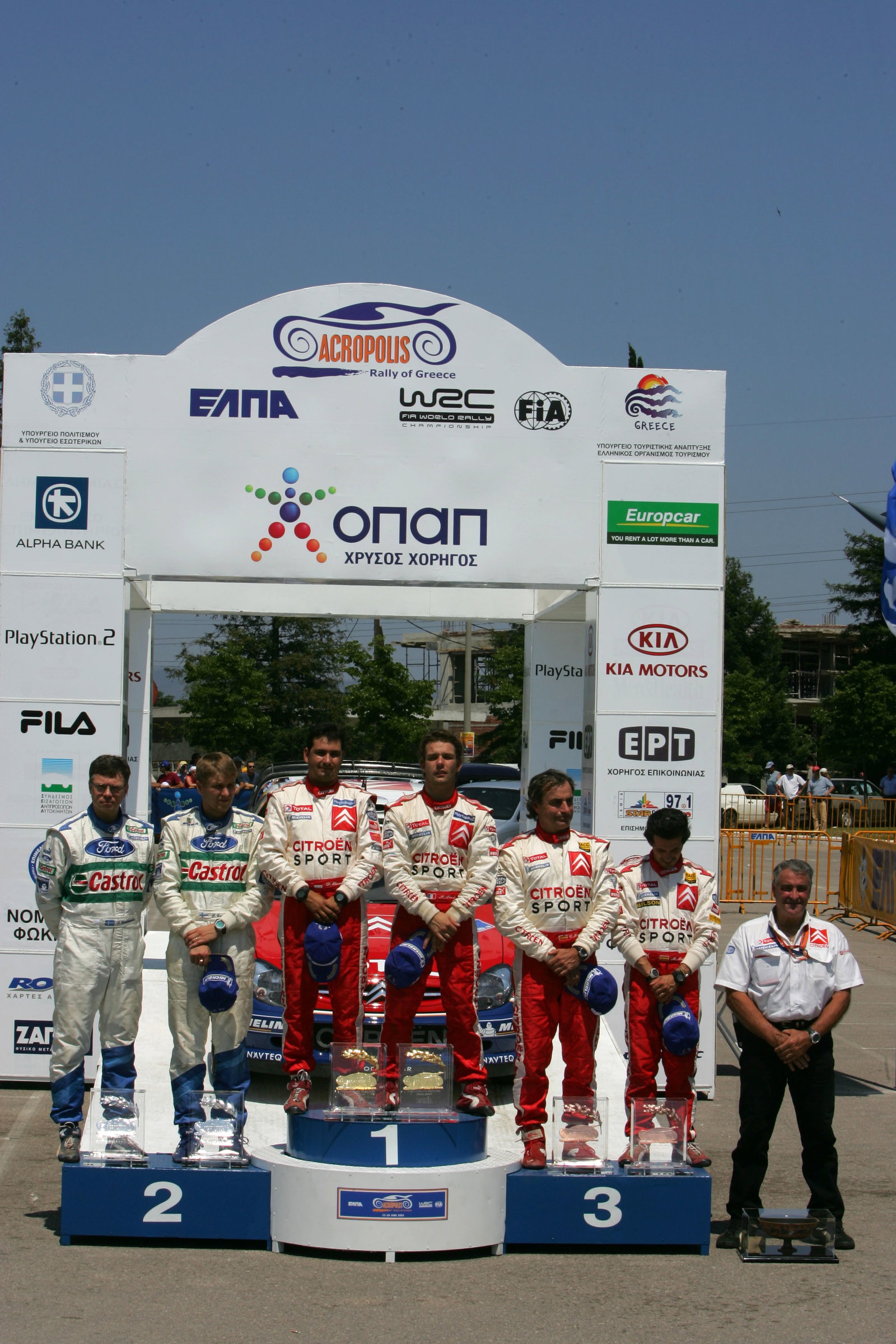 Acropolis Rally winners, Sebastien Loeb and Daniel Elena on the podium with Toni Gardemeister and J