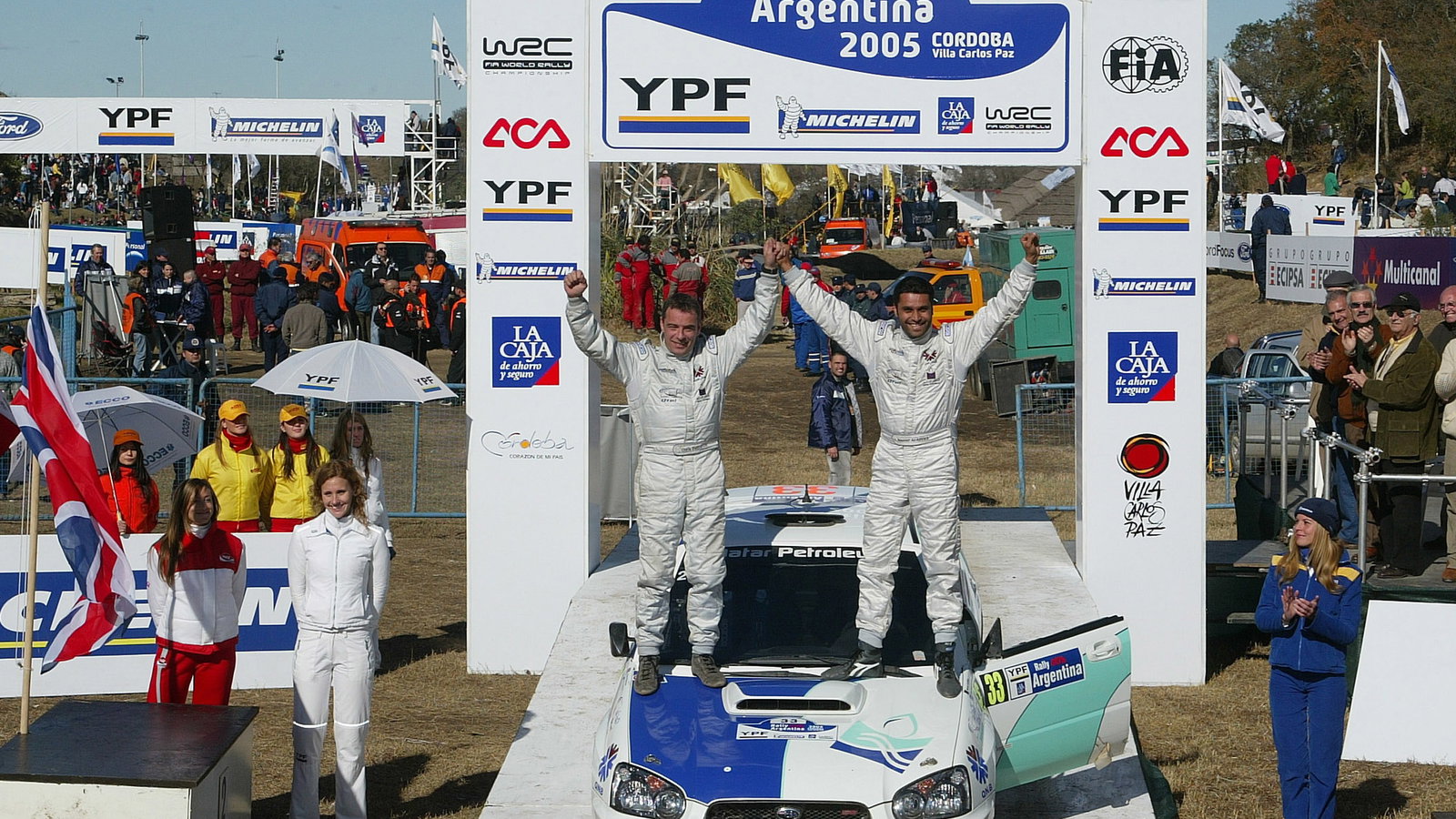 Nasser Al-Attiyah and Chris Patterson celebrate their victory in the PCWRC category on the Rally Arg