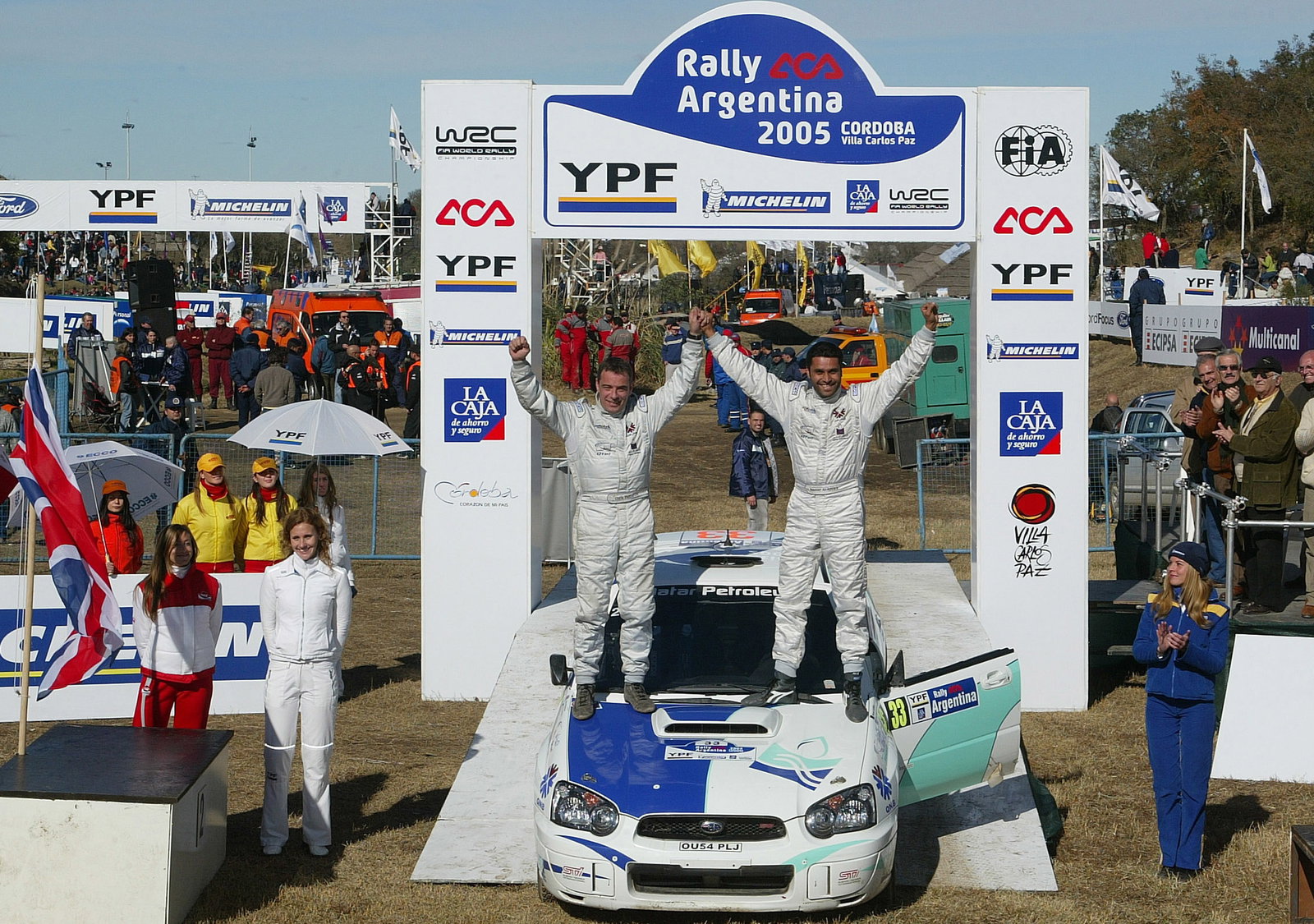 Nasser Al-Attiyah and Chris Patterson celebrate their victory in the PCWRC category on the Rally Arg