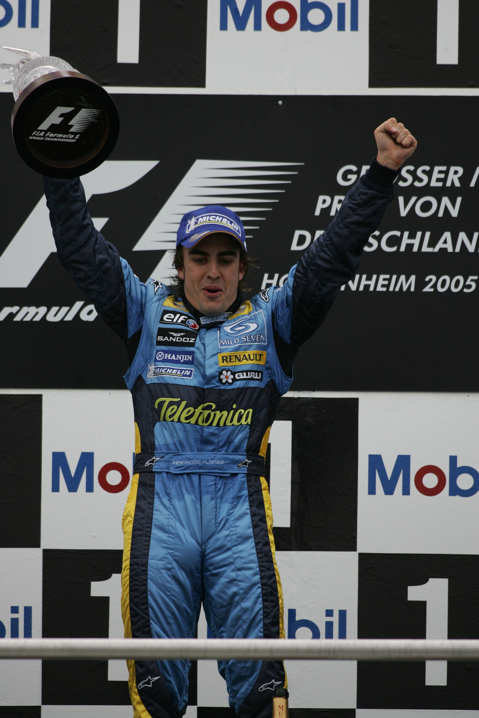 Race winner Fernando Alonso celebrates after the German Grand Prix