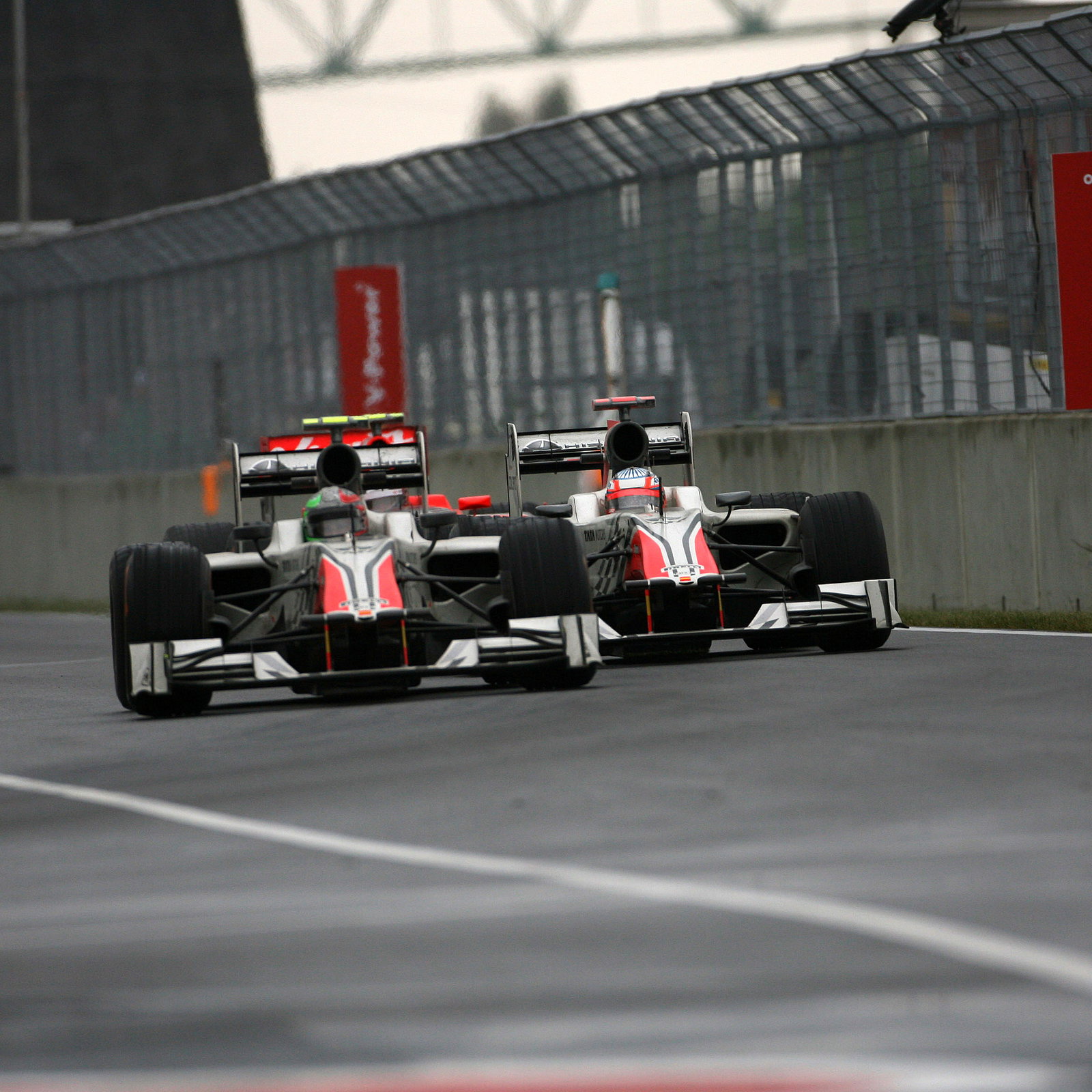12.06.2011- Race, Vitantonio Liuzzi (ITA), Hispania Racing F1 Team, HRT and Narain Karthikeyan (IND