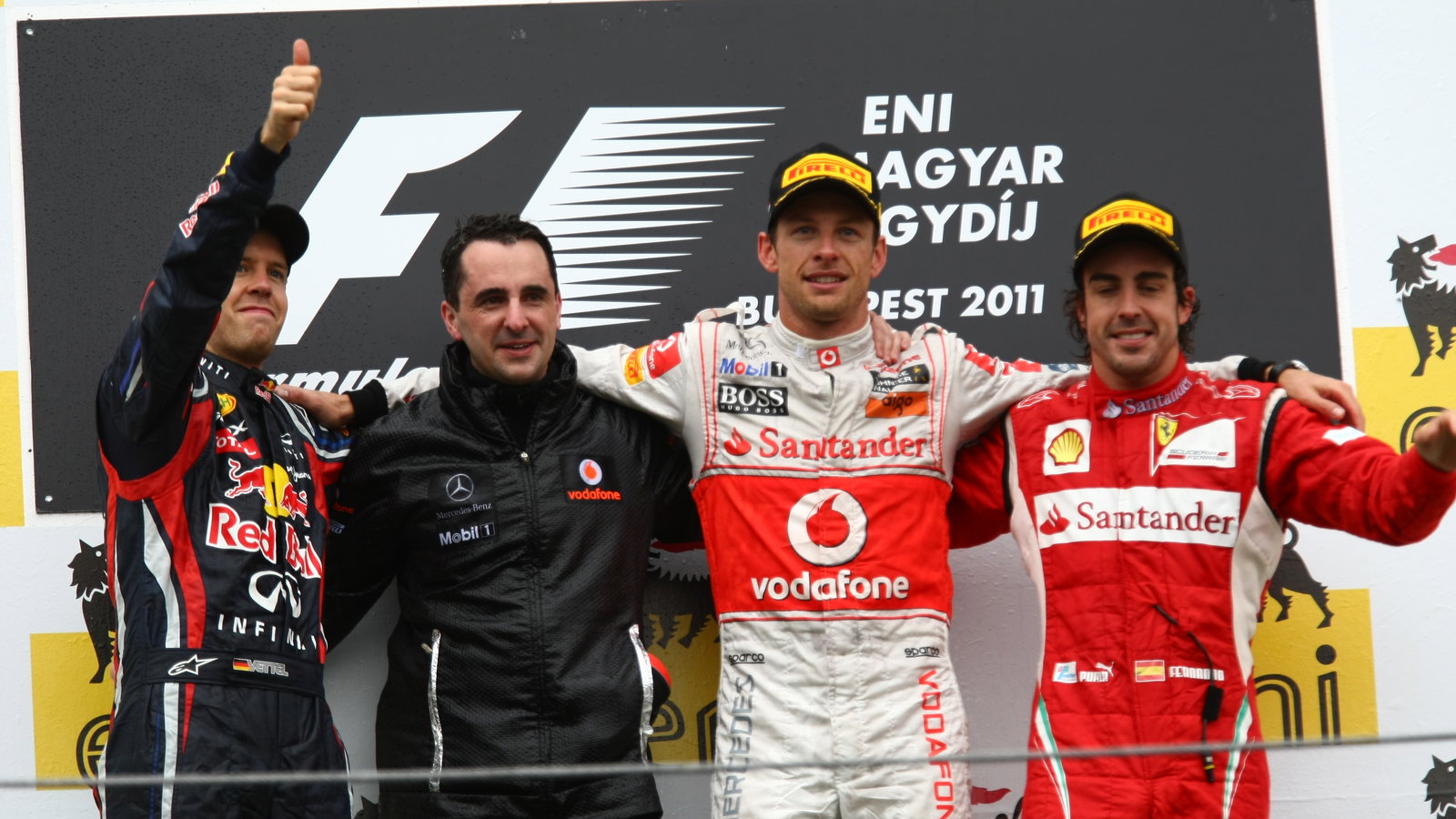 31.07.2011 podium: 1st Jenson Button (GBR), McLaren Mercedes, MP4-26, 2nd Sebastian Vettel (GER), Re