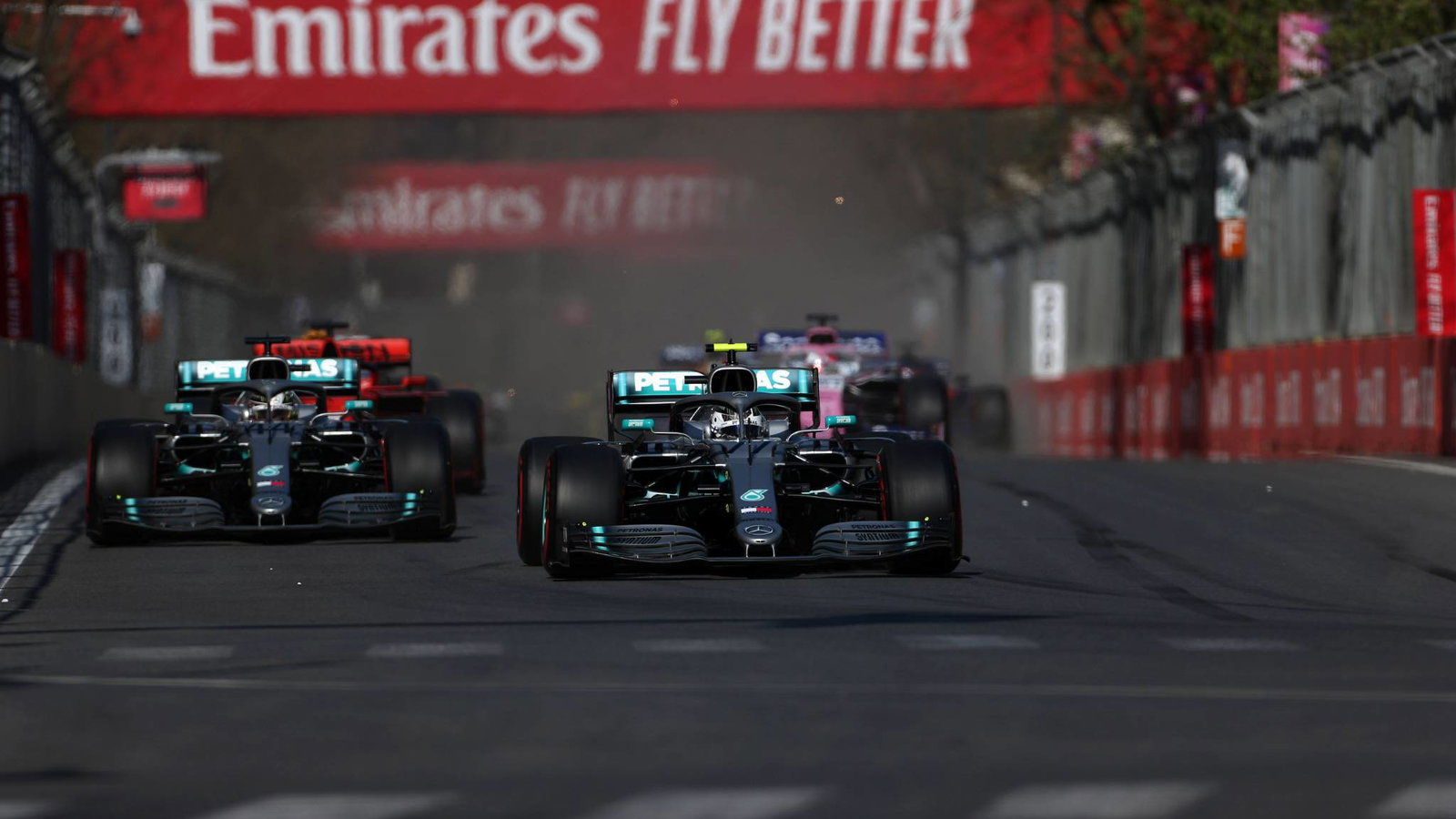Hamilton sacrificed 'selfish' aggression to keep Ferraris behind