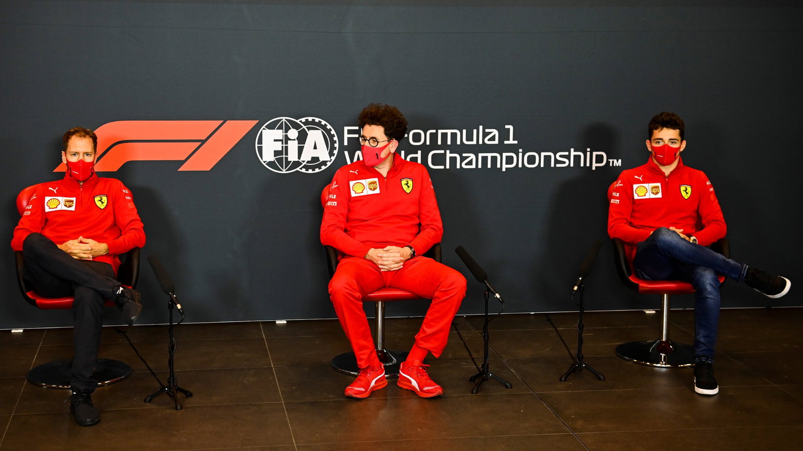 (L to R): Sebastian Vettel (GER) Ferrari; Mattia Binotto (ITA) Ferrari Team Principal; and Charles Leclerc (MON) Ferrari, in the FIA Press Conference.