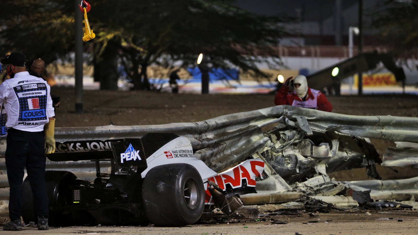 The heavily damaged Haas F1 