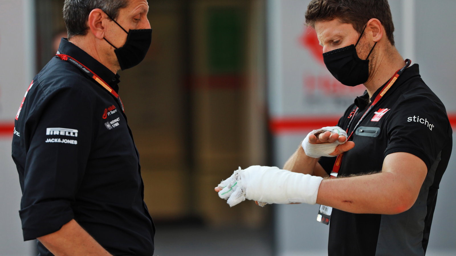 (L to R): Guenther Steiner (ITA) Haas F1 Team Prinicipal with Romain Grosjean (FRA) Haas F1 Team.