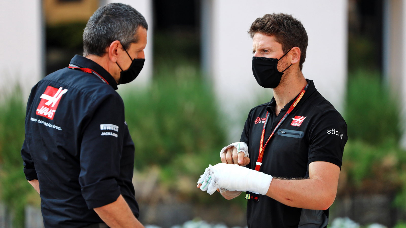 (L to R): Guenther Steiner (ITA) Haas F1 Team Prinicipal with Romain Grosjean (FRA) Haas F1 Team.