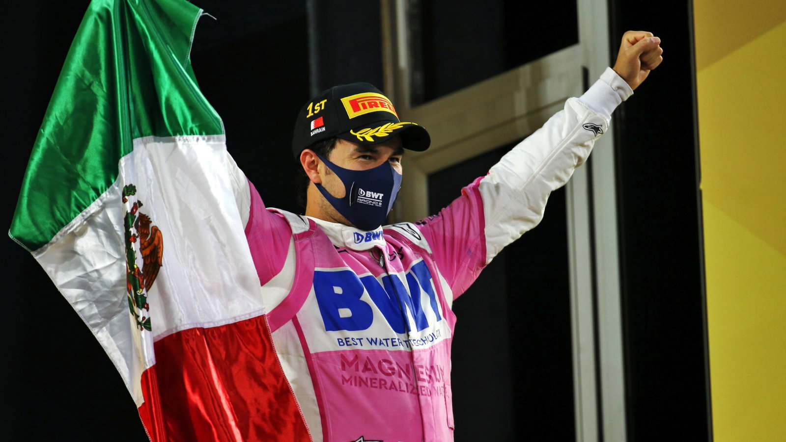 Race winner Sergio Perez (MEX) Racing Point F1 Team celebrates on the podium.