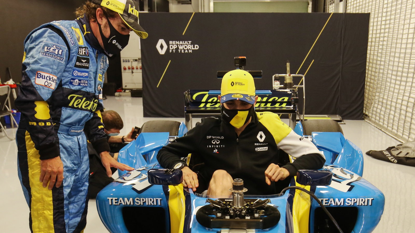 Fernando Alonso (ESP) Renault F1 Team with Esteban Ocon (FRA) Renault F1 Team in the Renault R25.