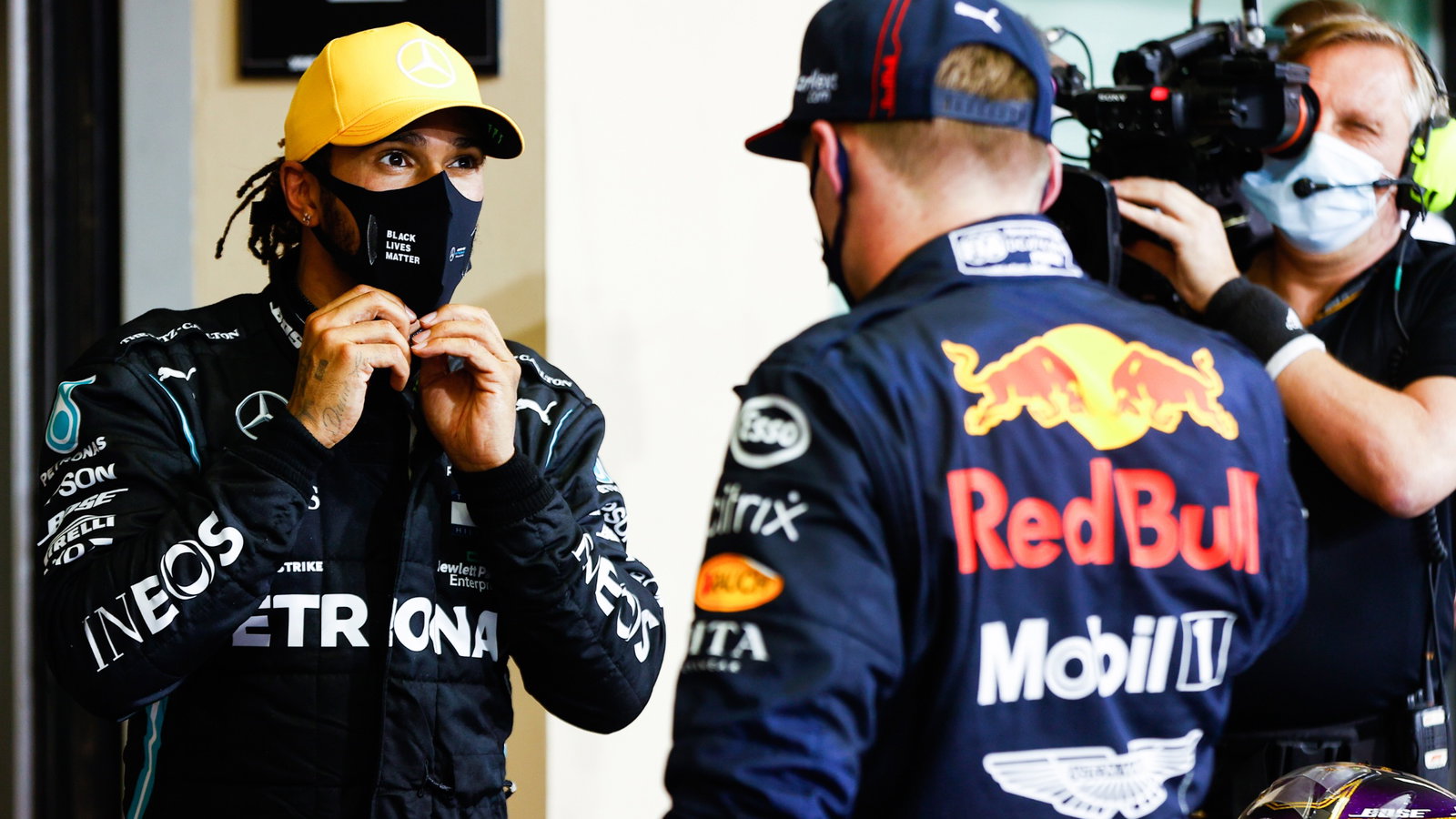 (L to R): Lewis Hamilton (GBR)