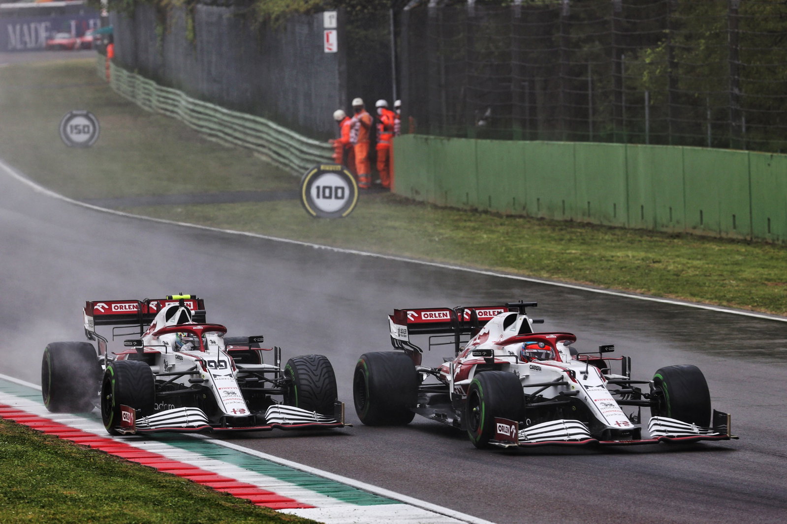 (L to R): Antonio Giovinazzi (ITA) Alfa Romeo Racing C41 and team mate Kimi Raikkonen (FIN) Alfa Romeo Racing C41 battle for position.