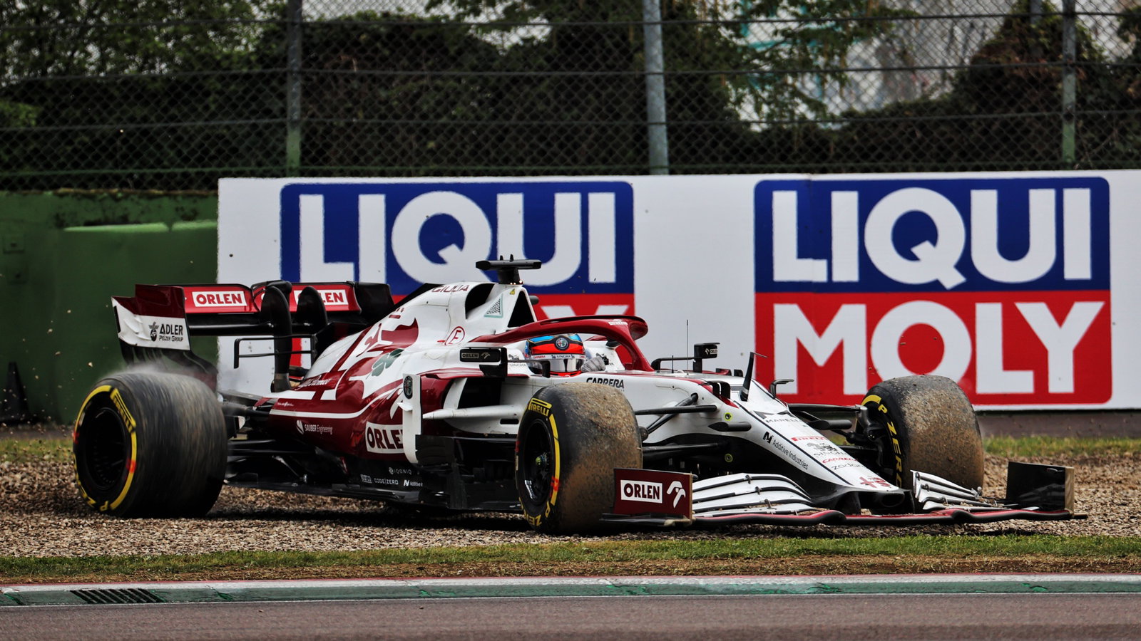 Kimi Raikkonen (FIN) Alfa Romeo Racing C41 rejoins the circuit.