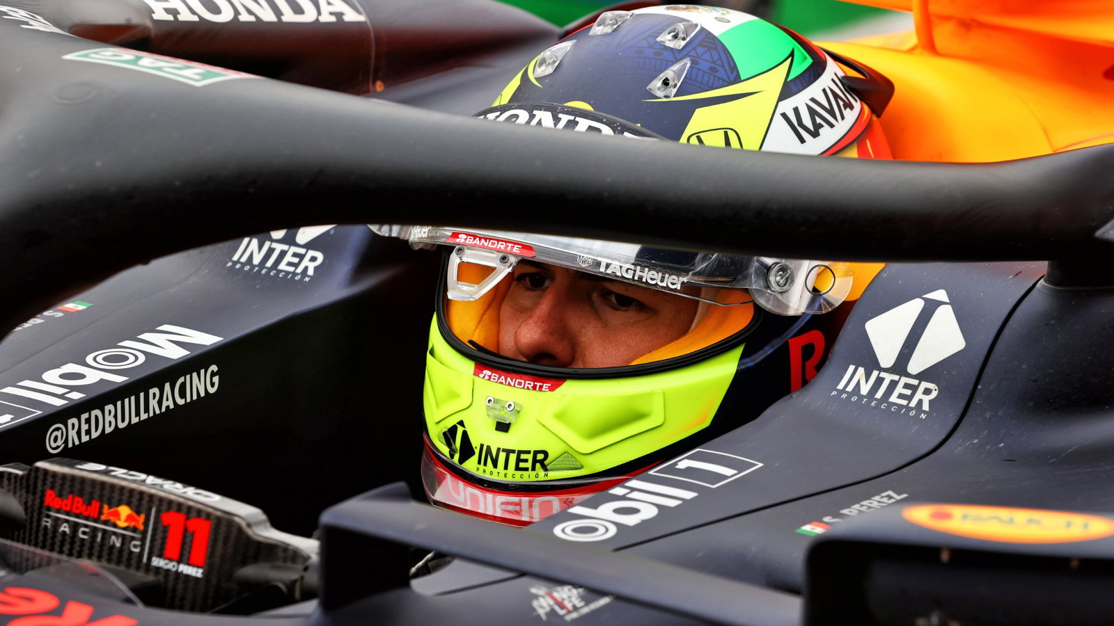 Sergio Perez (MEX) Red Bull Racing RB16B in the pits while the race is stopped.