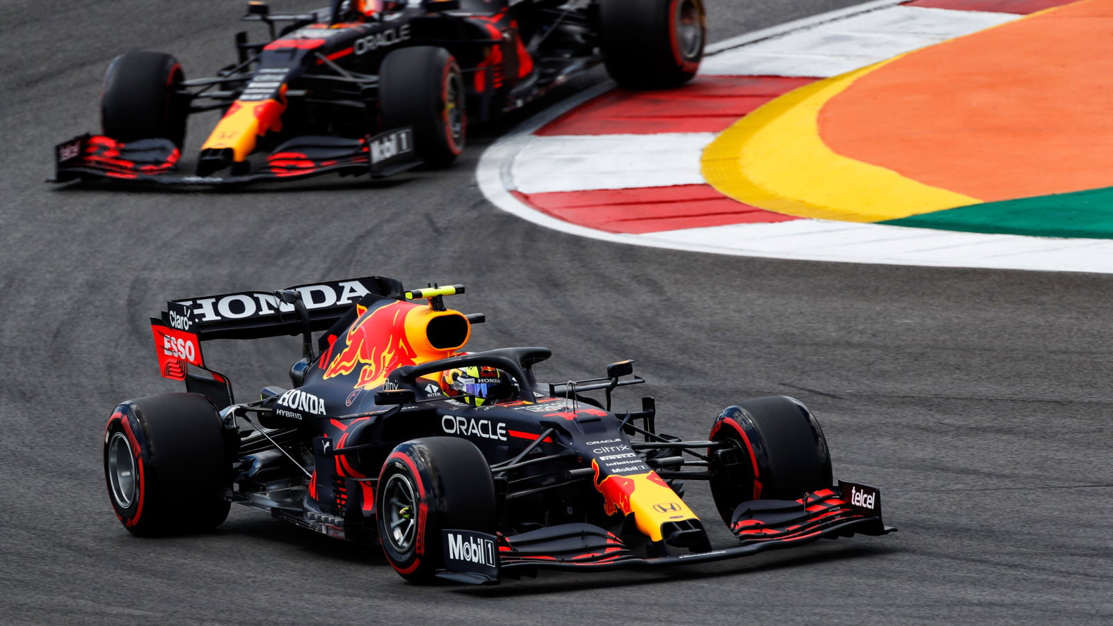 Sergio Perez (MEX) Red Bull Racing RB16B leads team mate Max Verstappen (NLD) Red Bull Racing RB16B.