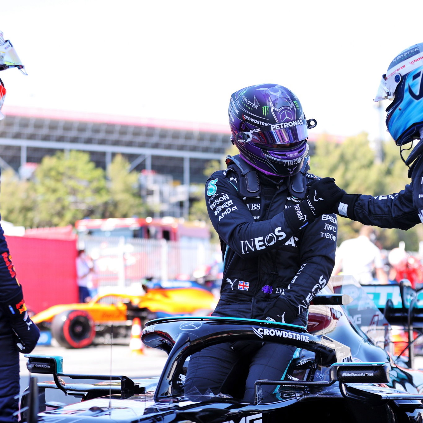 Lewis Hamilton (GBR) Mercedes AMG F1 W12 (Centre) celebrates his 100th pole position in qualifying parc ferme with team mate Valtteri Bottas (FIN) Mercedes AMG F1 (Right) and Max Verstappen (NLD) Red Bull Racing (Left).