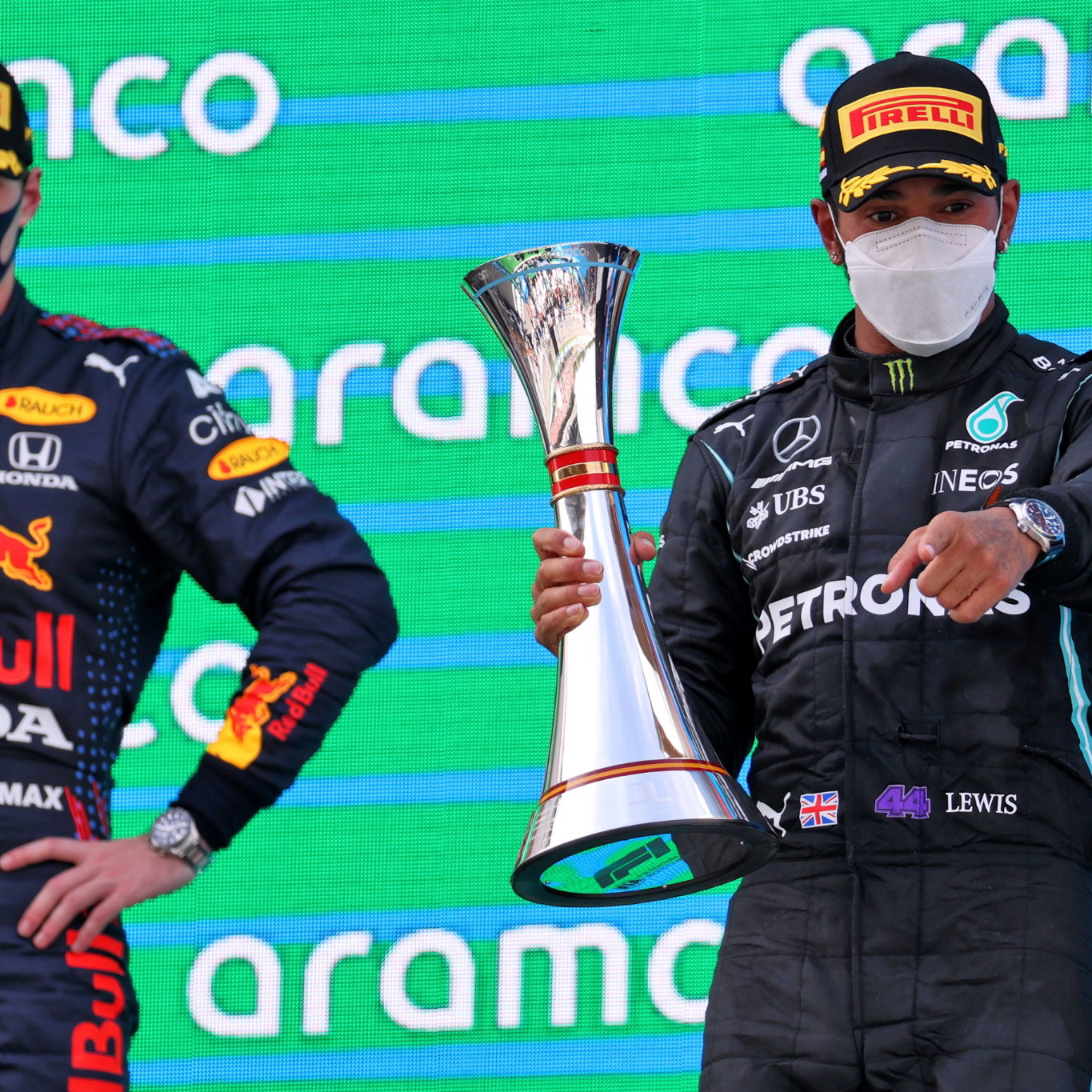 Race winner Lewis Hamilton (GBR) Mercedes AMG F1 celebrates on the podium with Max Verstappen (NLD) Red Bull Racing (Left).