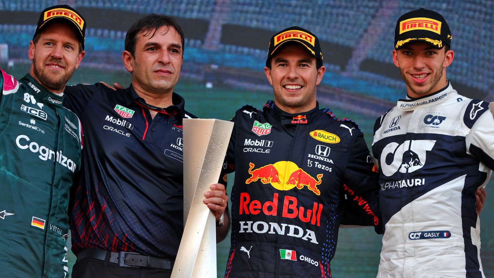 The podium (L to R): Sebastian Vettel (GER) Aston Martin F1 Team; second; Pierre Wache (FRA) Red Bull Racing Technical Director; Sergio Perez (MEX) Red Bull Racing, race winner; Pierre Gasly (FRA) AlphaTauri, third.