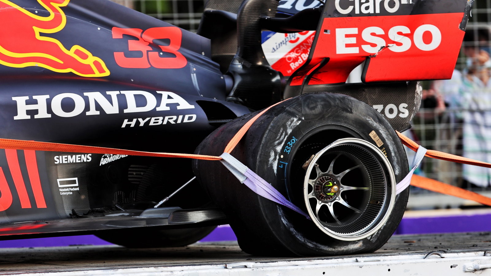 The Red Bull Racing RB16B of Max Verstappen (NLD) Red Bull Racing is recovered back to the pits on the back of a truck after he crashed out of the race.