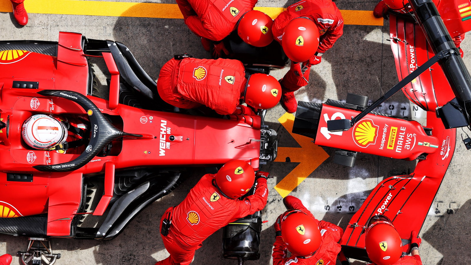 Charles Leclerc (MON) Ferrari SF-21 makes a pit stop to change a nosecone.