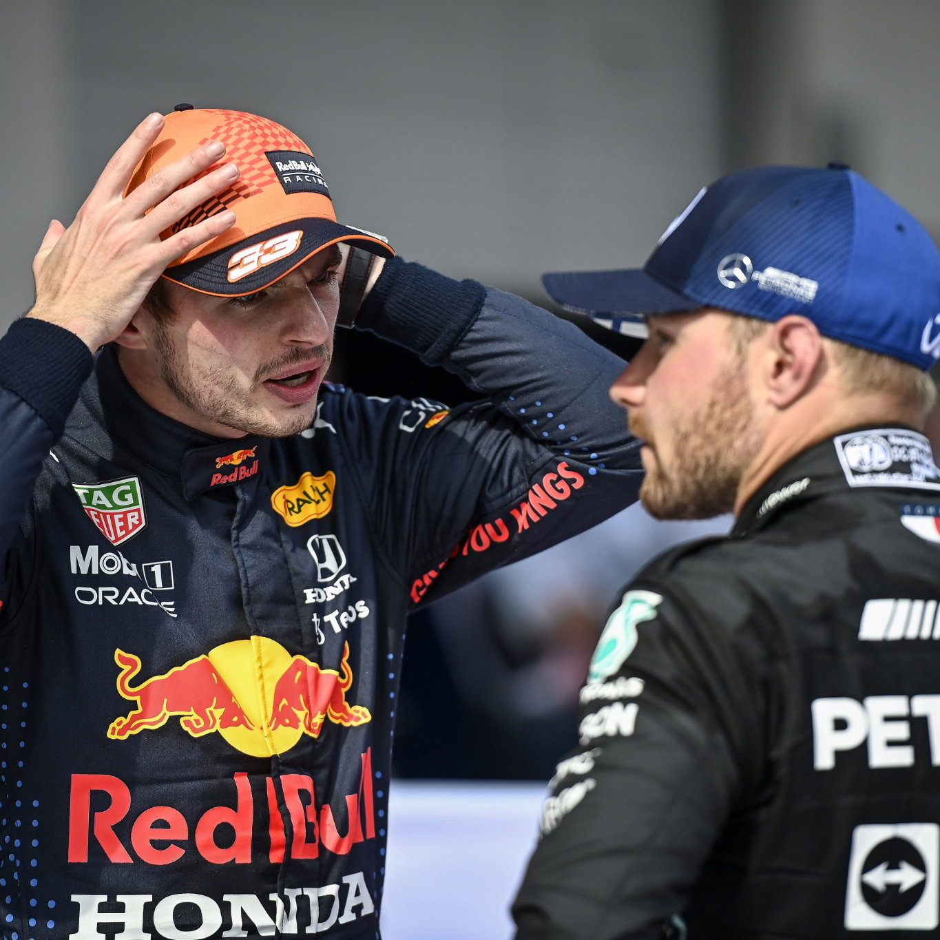 (L to R): Race winner Max Verstappen (NLD) Red Bull Racing with second placed Valtteri Bottas (FIN) Mercedes AMG F1 in parc ferme.