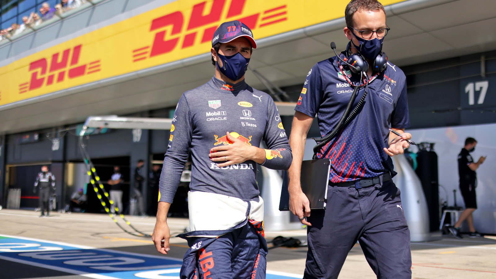 Sergio Perez (MEX) Red Bull Racing on the grid.