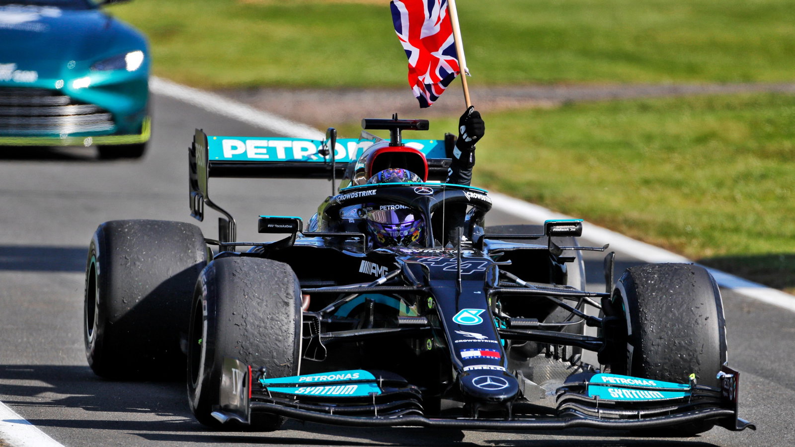 Race winner Lewis Hamilton (GBR) Mercedes AMG F1 W12 celebrates entering parc ferme.