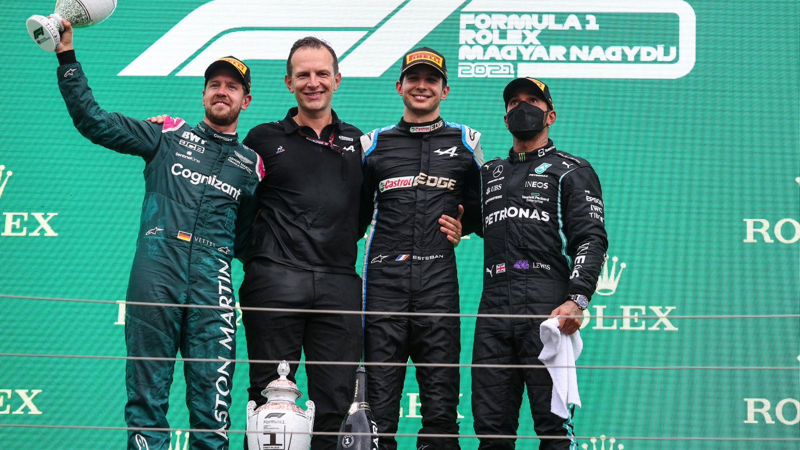 The podium (L to R): Sebastian Vettel (GER) Aston Martin F1 Team, second; Laurent Rossi (FRA) Alpine Chief Executive Officer; Esteban Ocon (FRA) Alpine F1 Team, race winner; Lewis Hamilton (GBR) Mercedes AMG F1, third.