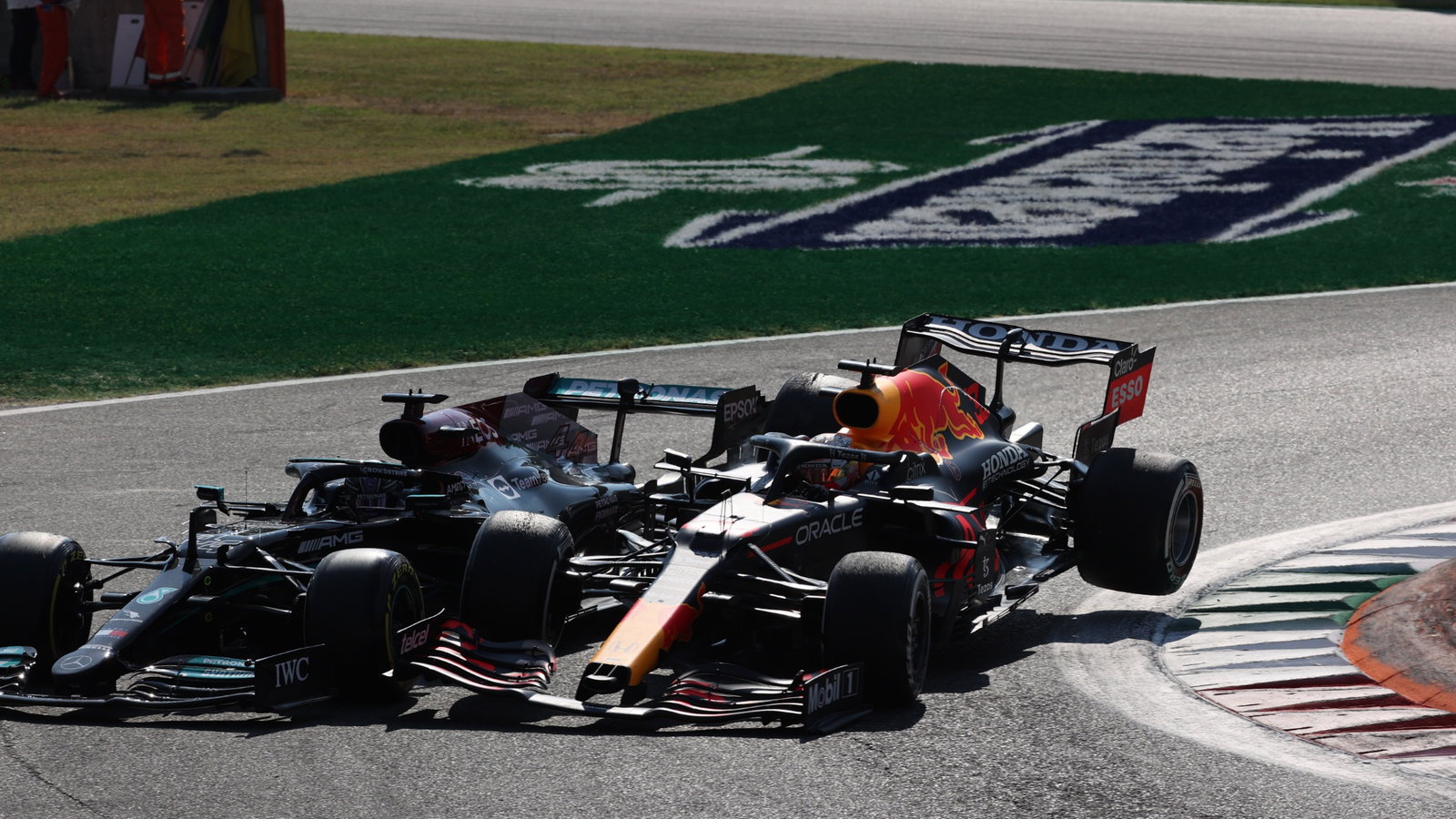 Max Verstappen (NLD) Red Bull Racing RB16B and Lewis Hamilton (GBR) Mercedes AMG F1 W12 crash at the first chicane.