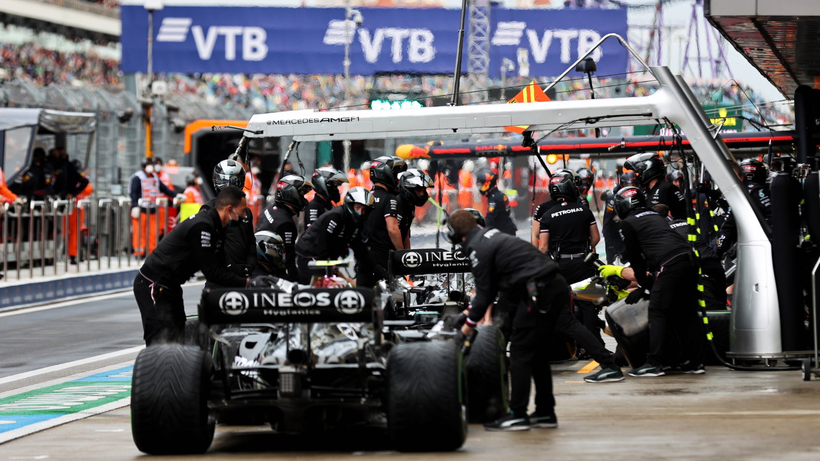 Lewis Hamilton (GBR) Mercedes AMG F1 W12 and Valtteri Bottas (FIN) Mercedes AMG F1 W12 in the pits.