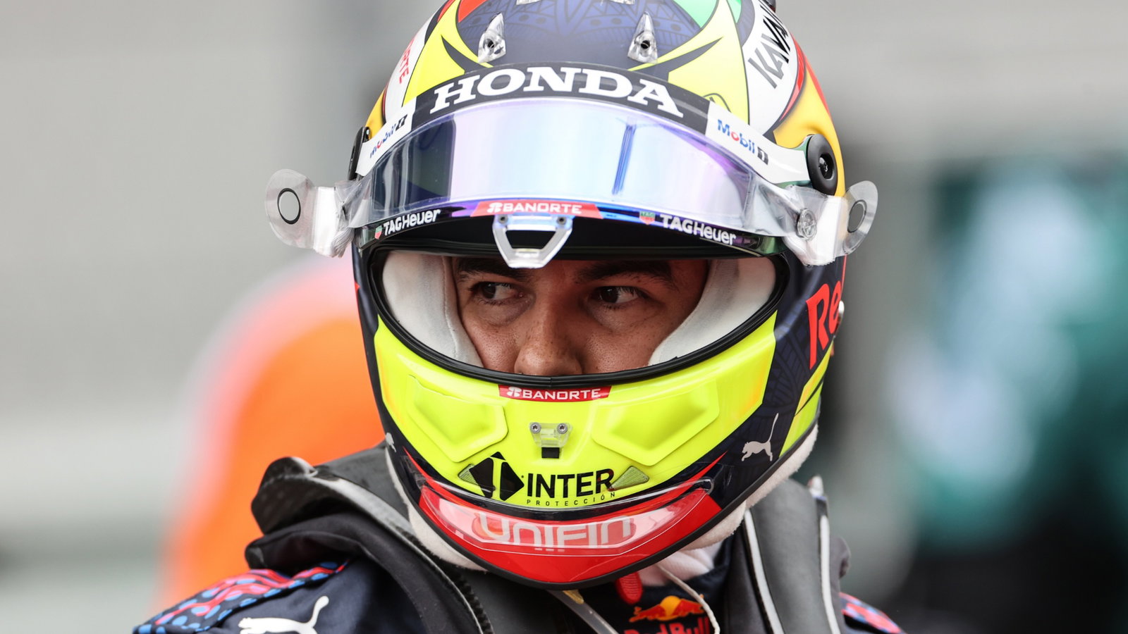 Sergio Perez (MEX) Red Bull Racing on the grid.