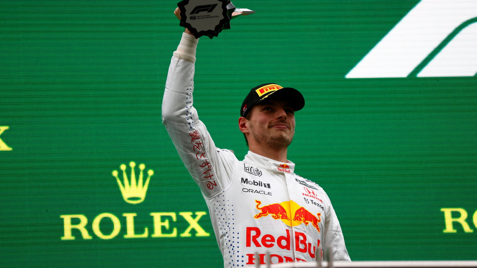 Max Verstappen (NLD) Red Bull Racing celebrates his second position on the podium.