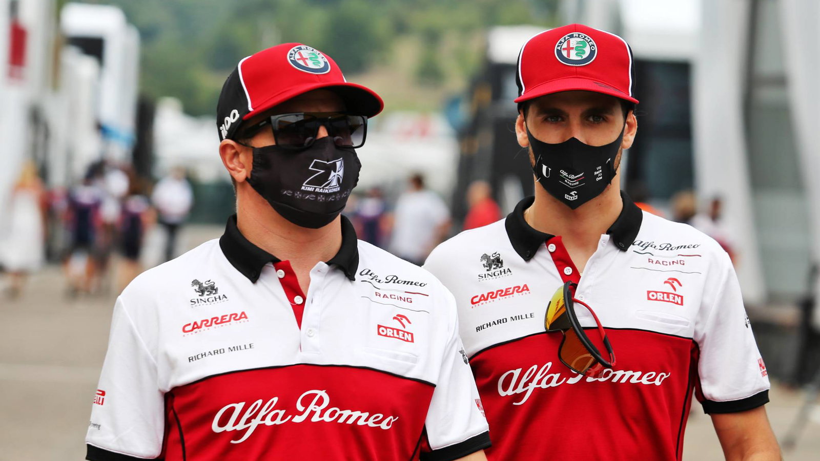 (L to R): Kimi Raikkonen (FIN) Alfa Romeo Racing with Antonio Giovinazzi (ITA) Alfa Romeo Racing.