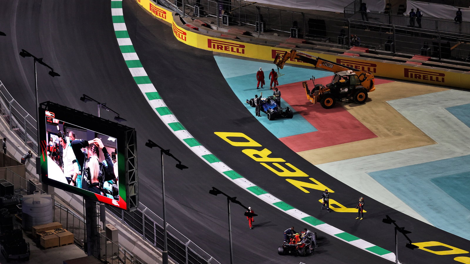 Marshals remove the Williams Racing FW43B of George Russell (GBR) Williams Racing and the Red Bull Racing RB16B of Sergio Perez (MEX) Red Bull Racing.