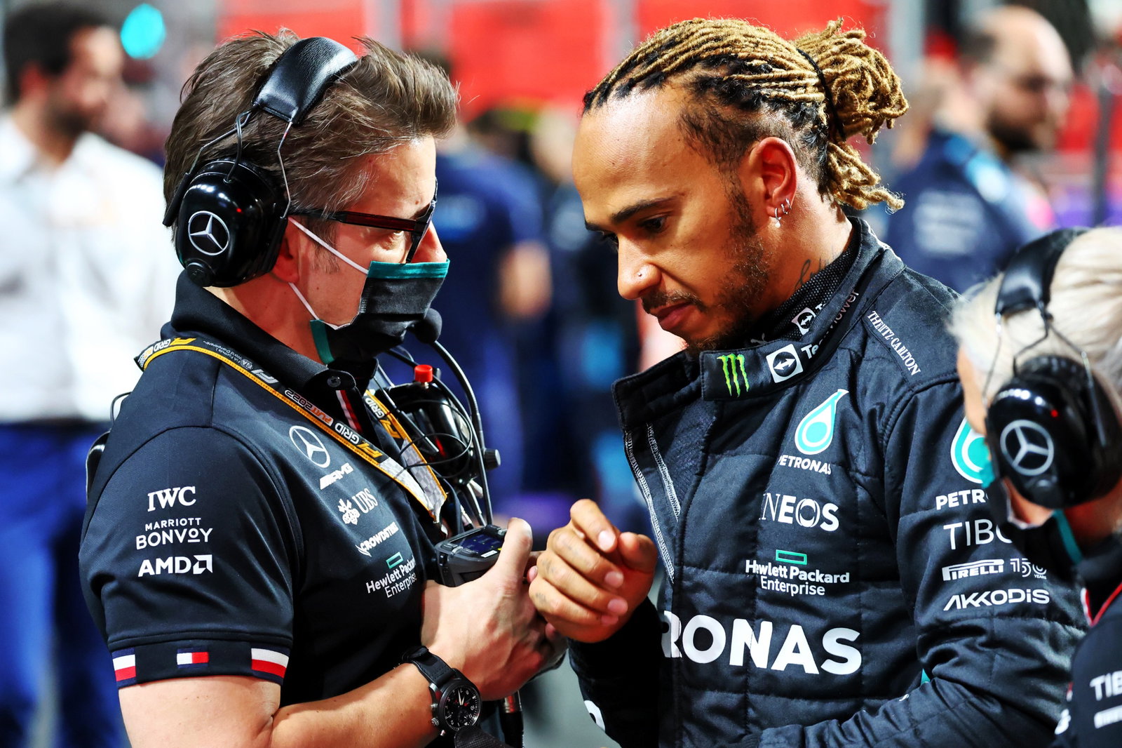 Mercedes AMG F1 Race Engineer with Lewis Hamilton (GBR) Mercedes AMG F1 on the grid.