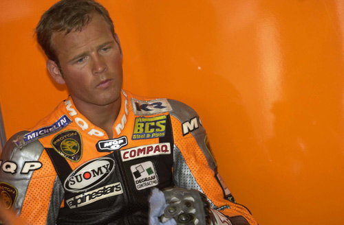 Criville crashes, girlfriend ordered home.