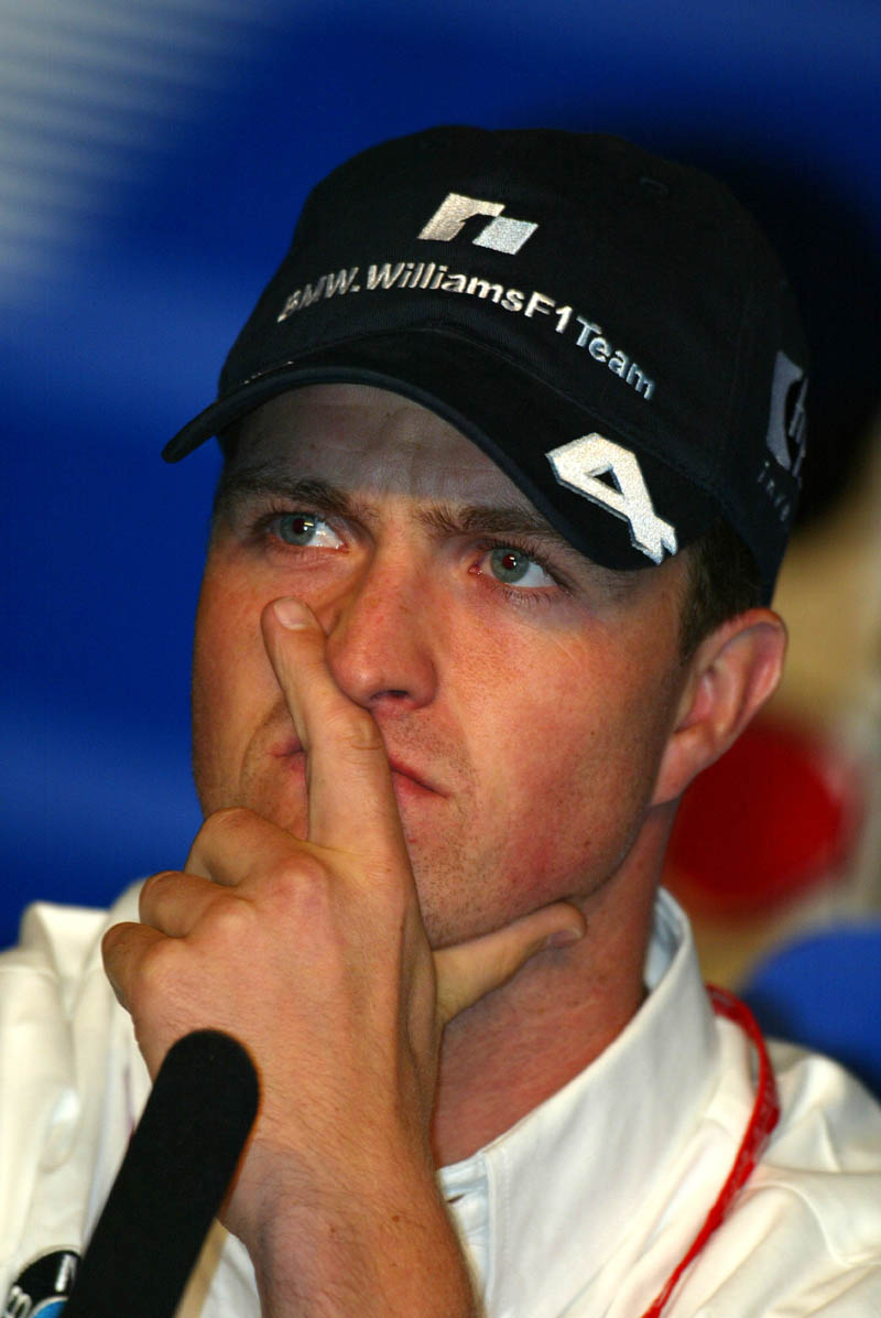 Trulli on top as rain reaches Indy.
