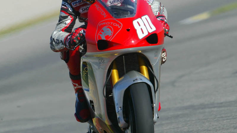 Bayliss shines, but Biaggi fastest as 2003 ends.