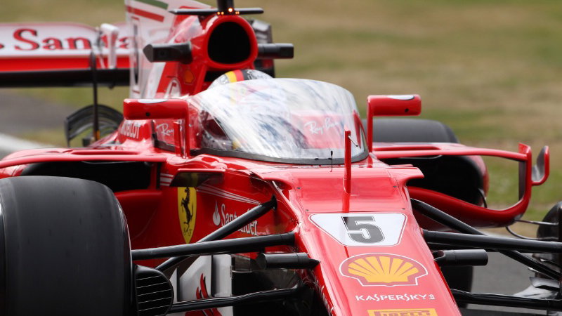 Sebastian Vettel and the Shield on his Ferrari SF70H