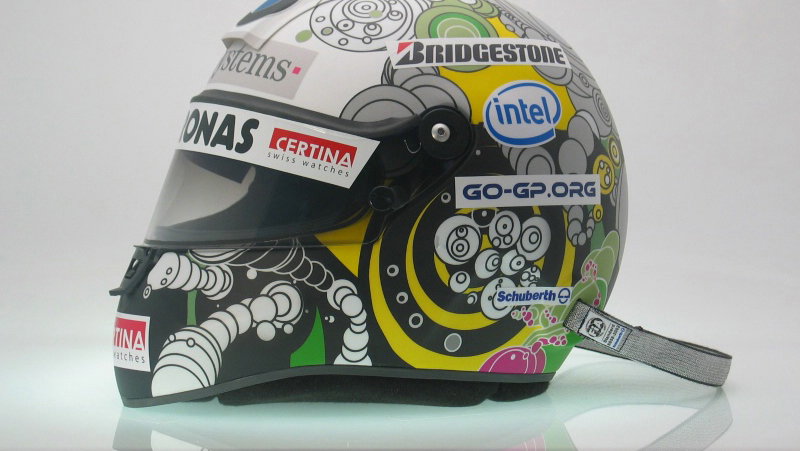 Heidfeld running new-look helmet at home race.