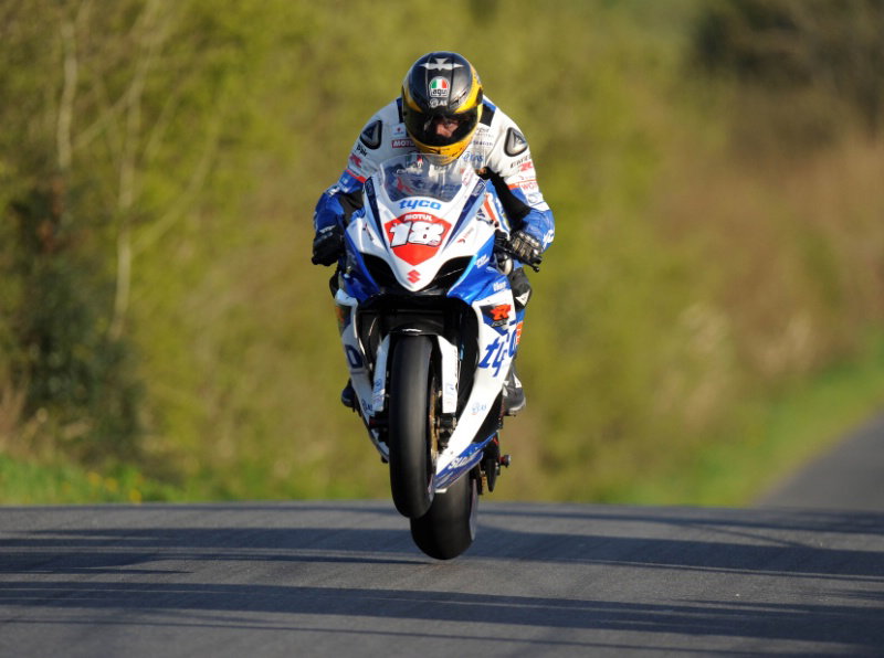 John McGuiness sets best Superbike time in wet at NW200