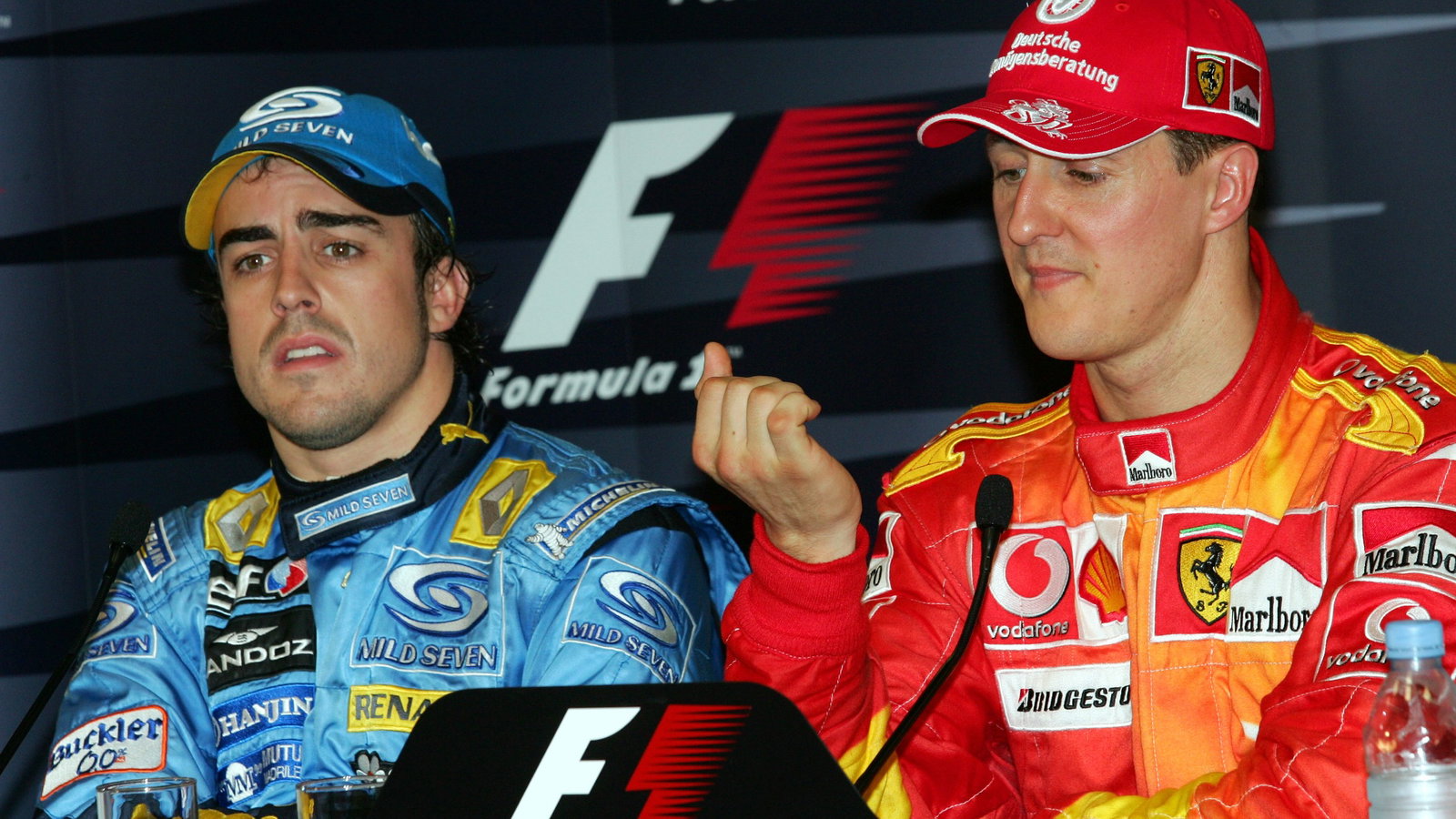  Monte Carlo, Monaco,Fernando Alonso (ESP), Renault F1 Team, in the new R26 and Michael Schumacher (GER), Scuderia Ferrari