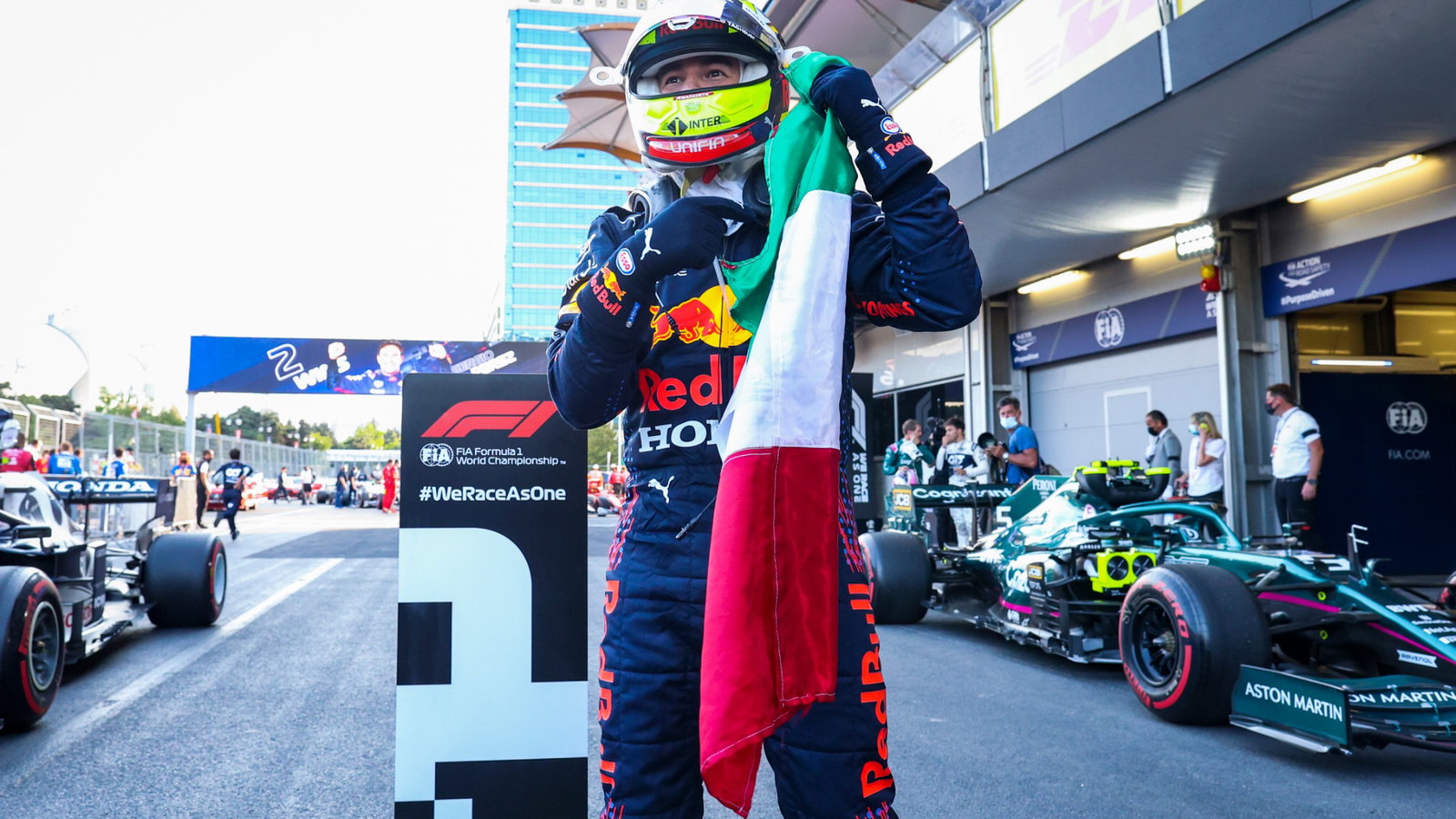 Race winner Sergio Perez (MEX) Red Bull Racing celebrates in parc