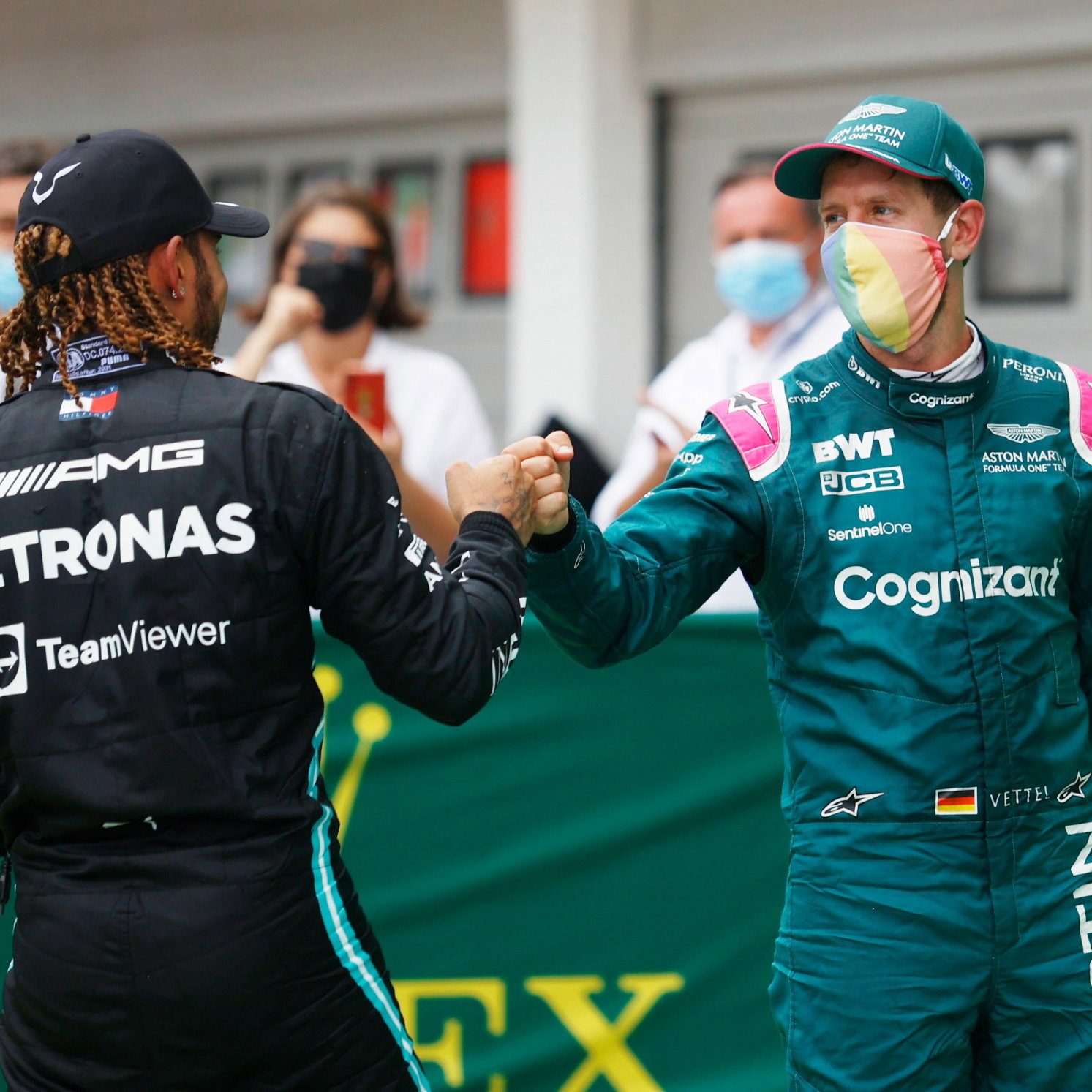 Lewis Hamilton (GBR) Mercedes AMG F1 celebrates his third position with second placed Sebastian Vettel (GER) Aston Martin F1