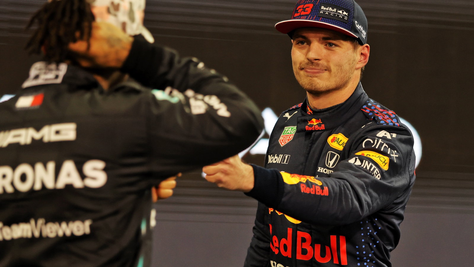 Max Verstappen (NLD) Red Bull Racing celebrates his pole position with second placed Lewis Hamilton (GBR) Mercedes AMG F1 in