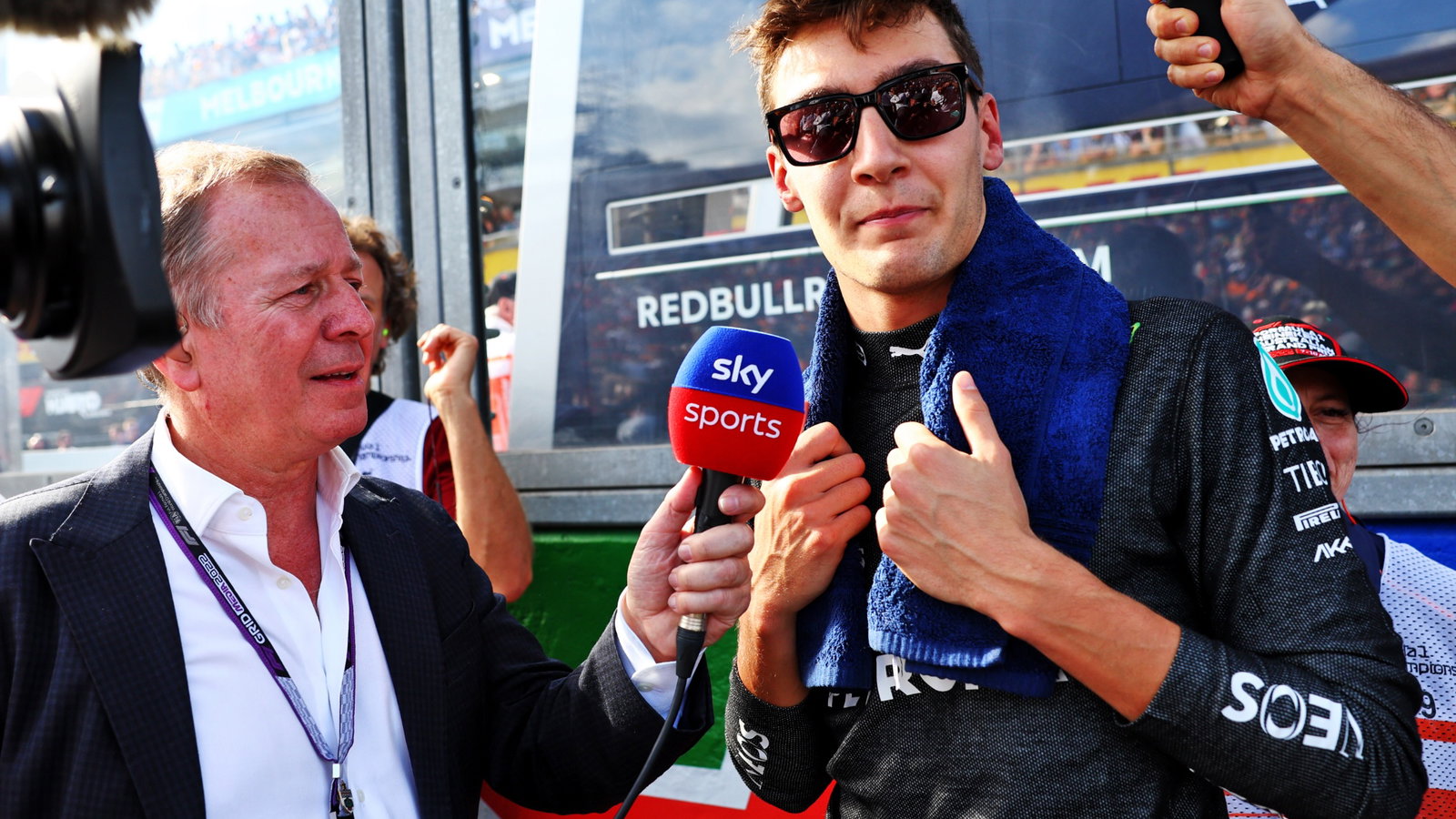 Martin Brundle (GBR) Sky Sports Commentator with George Russell (GBR) Mercedes AMG F1 on the grid. Formula 1 World
